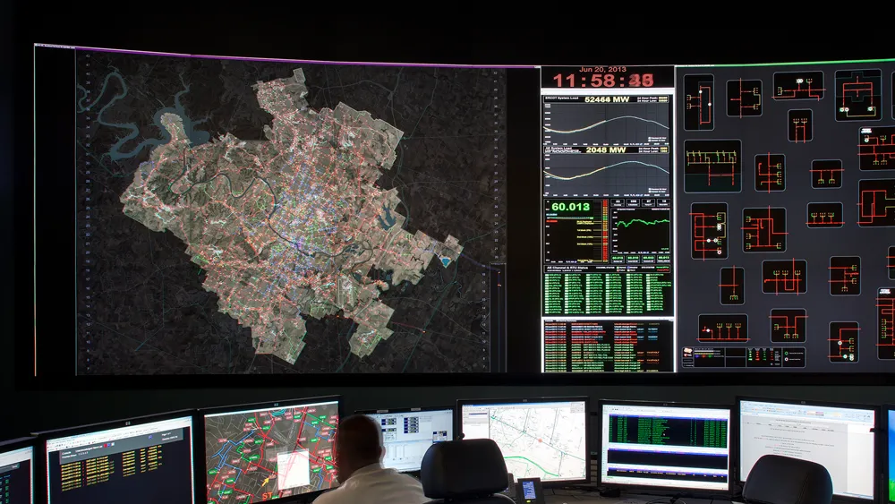 Grid operations centre with live charts and maps