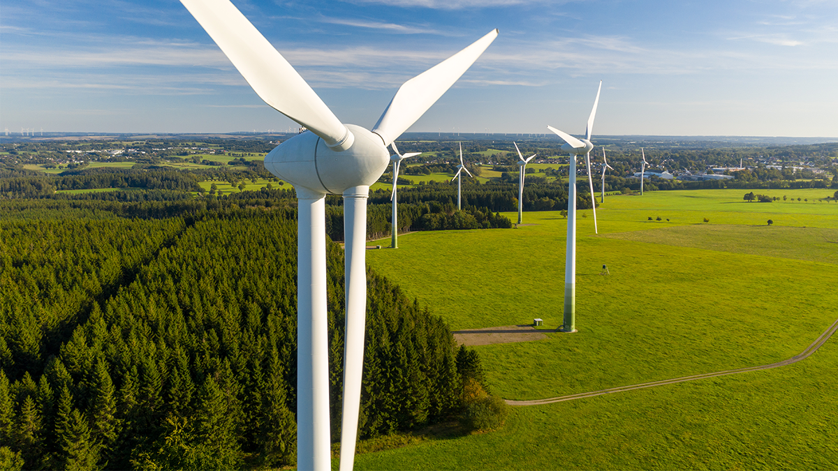 Wind turbines on a green Irish hillside